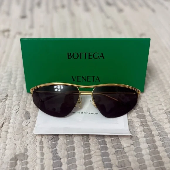 BOTTEGA VENETA Oval Metal Sunglasses In Gold and grey Bottega Veneta Sardine Oval Sunglasses - Gold | Editorialist main image 3